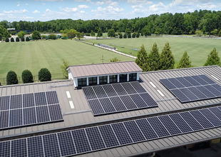 Solar panels are shown on the roof of a facility at Collegiate School in Richmond, Virginia.