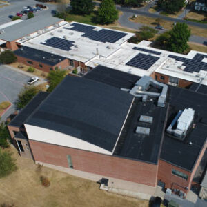 An aerial photo shows solar panels on the roof of Eastern Mennonite School in Harrisonburg, Virginia.